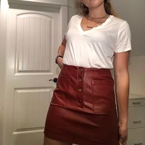 Red Faux Leather Skirt with Gold a button closure, never worn!